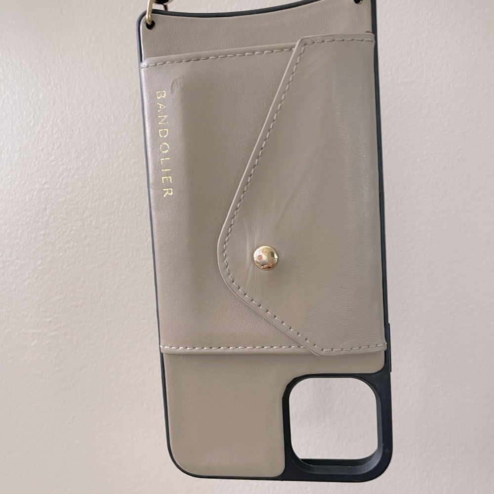 Bandolier phone case with strap.